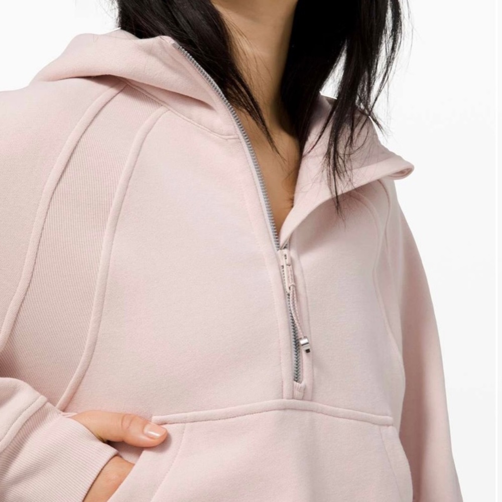 Scuba Half Zip from Lululemon. 
Color: Feather Pink 
Size: M/L